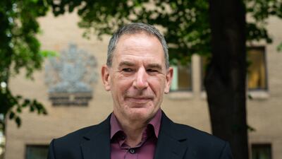 Extinction Rebellion activist James Brown whose 12-month jail term was cut by judges on Friday after he protested against climate change by gluing himself to a British Airways aircraft. PA