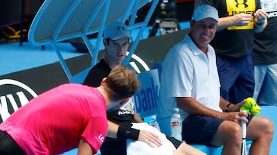 Andy Murray and his coach Ivan Lendl talk with Stan Wawrinka during a training session. David Gray / Reuters