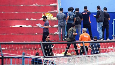Indonesian police continue investigation at the stadium on October 13. AFP