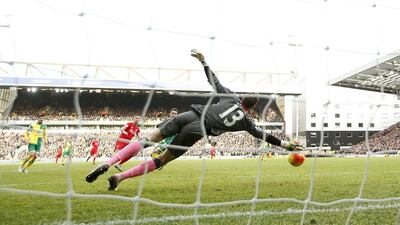 Jordan Henderson scores the 3-2 goal for Liverpool on Saturday against Norwich City in the Premier League. John Sibley / Action Images / Reuters