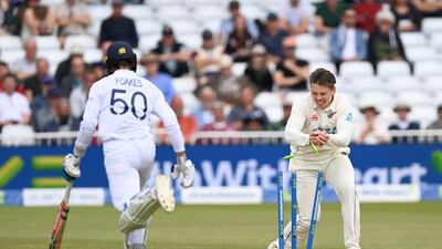 Michael Bracewell of New Zealand runs out England batter Ben Foakes for 56. Getty