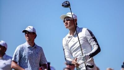 Haotong Ll tees off on the second tee. Victor Besa / The National