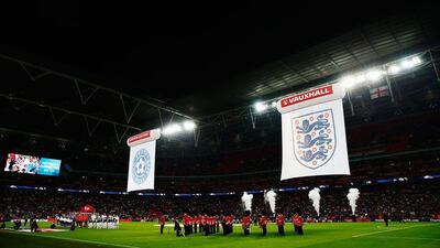 England and Estonia line up for their national anthems prior to the Euro 2016 qualifying match at Wembley on Friday night. Julian Finney / Getty Images