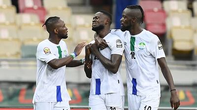 Sierra Leone's Musa Noah Kamara, centre, celebrates after scoring their opening goal. AFP