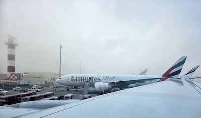 Dense fog blanketed the Dubai skyline on Tuesday morning, leading to the cancellation of a number of flights. Photo: EPA