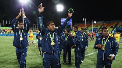 Gold medallists Fiji celebrate after the medal ceremony for the Men’s Rugby Sevens at the Rio 2016 Olympics on August 11, 2016 in Rio de Janeiro, Brazil. David Rogers / Getty Images