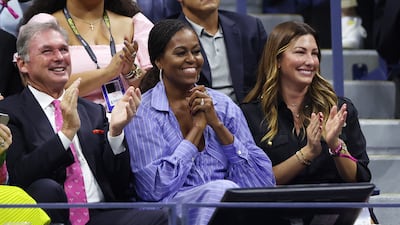 US Tennis Association chief Michael J. McNulty, left, former First Lady Michelle Obama, centre, and philanthropist Jill McCormick watch the US Open semi-final between Carlos Alcaraz and Frances Tiafoe in New York on Friday, September 9, 2022. AFP