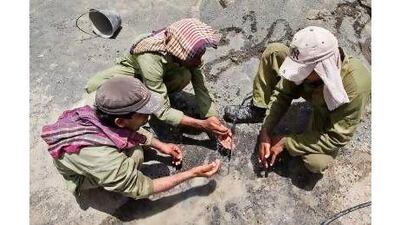 Enforcing laws on midday breaks can be tough with some companies, a reader says. Antonie Robertson/ The National