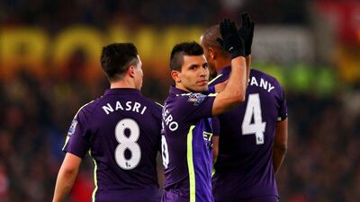 Sergio Aguero of Manchester City celebrates after scoring his team's third goal from the penalty spot in their Premier League win against Stoke on Wednesday. Alex Livesey / Getty Images / February 11, 2015