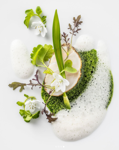 Grilled turbot with frothy blue mussels and spring shoots at Jordnær. Photo: @evjordnaer / Instagram