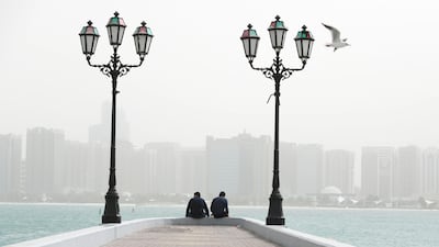 Dusty and windy along the Abu Dhabi Corniche. Khushnum Bhandari for The National