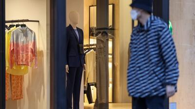 A pedestrian walks along Regent Street, London. The Office for National Statistics is due to release the latest UK retail sales figures on Friday. Photographer: Hollie Adams / Bloomberg