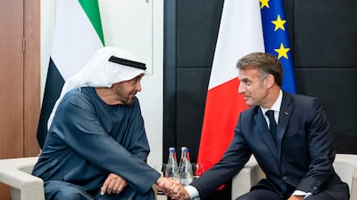 Sheikh Mohamed with Mr Macron. Abdulla Al Neyadi / UAE Presidential Court