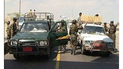Yemeni security forces set up a road block in Aden after an al Qa'eda attack in June. The group is looking to build a following in the city.