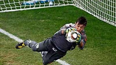 Uruguay's goalkeeper Fernando Muslera holds onto the Jabulaini World Cup ball during yesterday's second round match with South Korea.