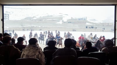 Spectators watch the melee from inside the viewing area.