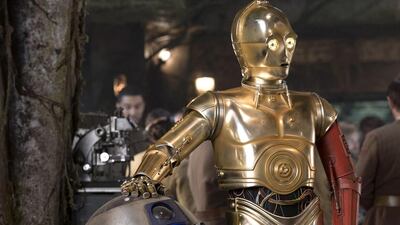 R2-D2, left, and C-3PO in a scene from the film Star Wars: The Force Awakens. David James / Disney / Copyright Lucasfilm 2015 via AP