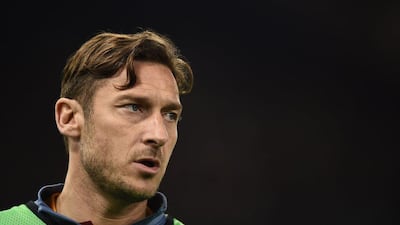 Roma's forward Francesco Totti warms up during the UEFA Champions League football match AS Roma vs Real Madrid on Frebruary 17, 2016 at the Olympic stadium in Rome. AFP PHOTO / FILIPPO MONTEFORTE