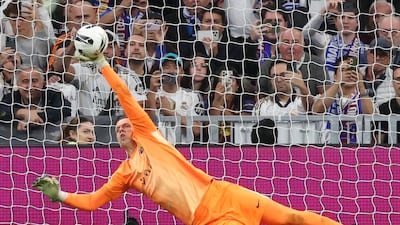 Barcelona goalkeeper Wojciech Szczesny saves Kylian Mbappe's penalty. AFP