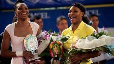 Venus, left, and Serena have won 20 grand slams between them and yesterday both were picked for the US Olympic team. Raul Aroboleda / AFP
