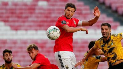 Ruben Dias, centre, scored for Benfica against Moreirense in what is expected to be his final game for the Portuguese giants. AP Photo