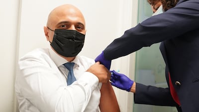 Health Secretary Sajid Javid receives his Covid-19 booster jab from Nikki Kanani, Medical director primary care NHS England, at a pharmacy in central London. Picture date: Wednesday November 17, 2021. PA
