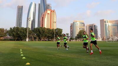 Al Jazira players take part in a training session at Emirates Palace Sports Complex ahead of the Fifa Club World Cup. Chris Whiteoak / The National