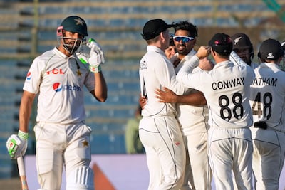 New Zealand's Ish Sodhi, centre, celebrates the wicket of Pakistan's Shan Masood. AP