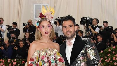 Josephine Skriver was dressed like a modern day Little Bo Peep, while her (unnamed) companion outshone her in artfully mismatched florals. AFP