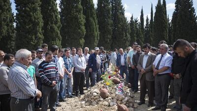 The rescue workers have battled unexpected fires since Tuesday’s initial fire and explosion, including one that broke out earlier Saturday. Oli Scarff / Getty Images / May 17, 2014