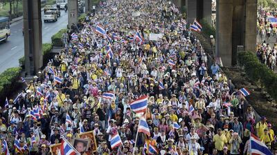 Anti-government protesters march during a rally in Bangkok. Dylan Martinez / Reuters