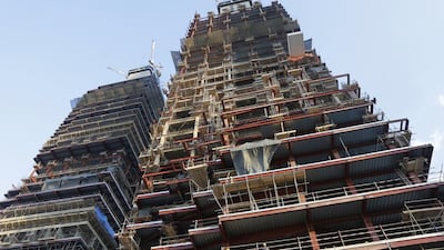 Above, construction work at Tiara United Towers, a high rise development by Arabtec. Jeffrey E Biteng / The National