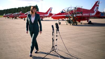 Britain's Chancellor of the Exchequer Rachel Reeves walks off after speaking to the media during a visit to RAF Waddington in eastern England. AFP
