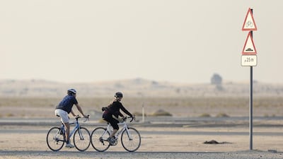Cyclists at Al Qudra Cycle Track in Dubai. Sarah Dea / The National