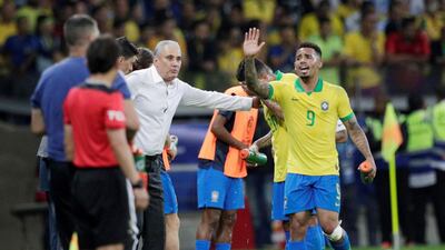 Brazil coach Tite and Brazil's Gabriel Jesus. Reuters