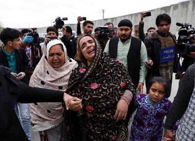 An Afghan Sikh woman mourns for her relatives near the site of a deadly attack in Kabul. Reuters