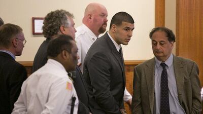 Former NFL player Aaron Hernandez listens after he was sentenced to life in prison for murder in Massachusetts on Wednesday. Dominick Reuter / Reuters / April 15, 2015
