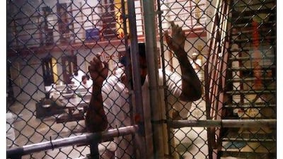 Guantanamo Bay, Cuba: the facility's international reputation remains tied to the 'enhanced interrogation techniques' such as waterboarding employed under the Bush administration. John Moore / Getty Images / AFP