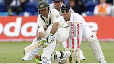 Ricky Ponting, left, expertly executes the sweep shot off Monty Panesar during his chanceless hundred in Cardiff. The Australia captain passed the 11,000 Test-run mark during the course of his knock.