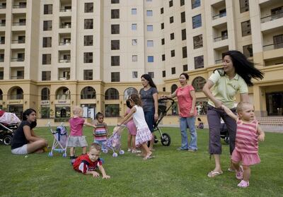 Many domestic workers look after more than one generation of a family. Nicole Hill / The National