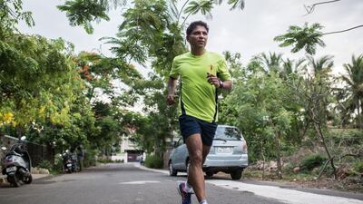 The quiet neighbourhood streets of Palavakkam provides a perfectly green and safe running route for Shahul Hameed runs in the evenings during Ramadan to avoid the hear and the city’s busy roads. Gayatri Nair for The National