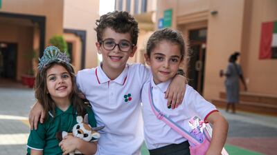 All smiles as pupils return to Raha International School Abu Dhabi. Victor Besa / The National