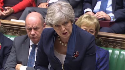 Britain's first secretary of state, Damian Green, sitting behind prime minister Theresa May, has been accused of watching pornographic images at work. Parliament TV handout via Reuters