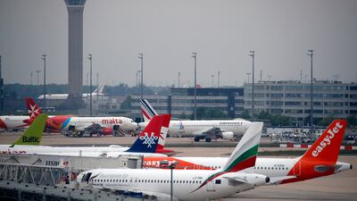 Planes at Paris Charles de Gaulle Airport. The EU is stepping up measures that will move air travel towards more sustainable fuels. AP