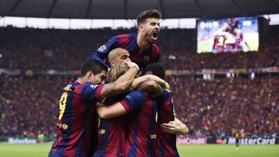 Barcelona players celebrate after beating Juventus 2-1 in the final to win the Uefa Champions League. Dylan Martinez / Reuters