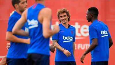 French forward Antoine Griezmann, second right, trains with his new Barcelona teammates at the Joan Gamper training ground in Sant Joan Despi near Barcelona. AFP