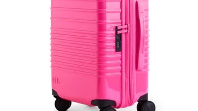 Carry-on roller in Barbie Pink, $218, www.beistravel.com. Photo: Beis / Mattel 2023