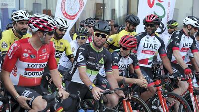 Mark Cavendish, centre, says Abu Dhabi has become home to him and his family. Pawan Singh / The National