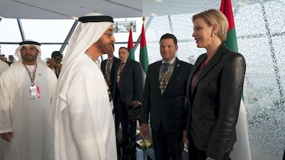 Sheikh Mohamed bin Zayed, Crown Prince of Abu Dhabi and Deputy Supreme Commander of the UAE Armed Forces (L), speaks with Princess Charlene of Monaco on the final day of the 2018 Formula 1 Etihad Airways Abu Dhabi Grand Prix, in Shams Tower. Ryan Carter / Ministry of Presidential Affairs