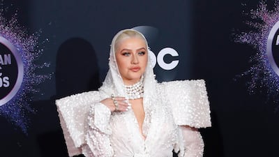 Christina Aguilera, in Jean Paul Gaultier, arrives at the American Music Awards on Sunday, November 24, 2019, at the Microsoft Theatre in Los Angeles. EPA